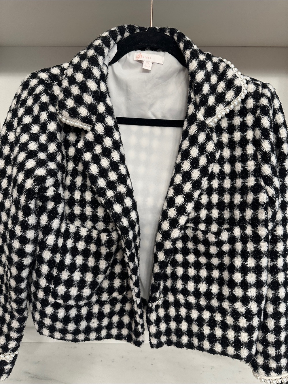 GB girls size 16 extra large black and white jacket. Great condition